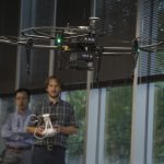 Professors fly a drone