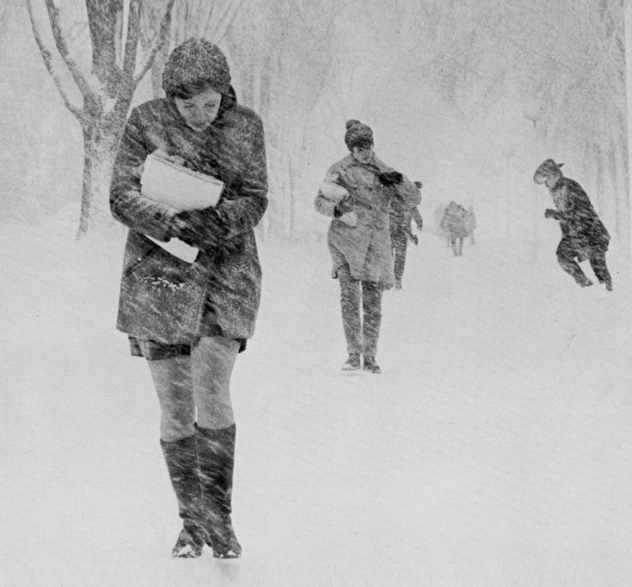 students walking on the quad in blizzard conditions