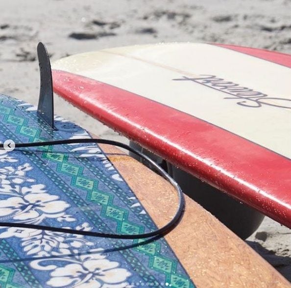 Instagram image of surfboards in the sand