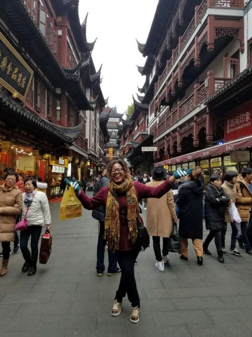 Cynthia Malambi on a crowded street in China