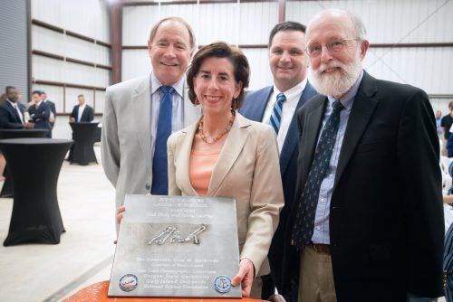 President David M. Dooley, Rhode Island Governor Gina Raimondo, Rhode Island Council on Postsecondary Education Chair Timothy DelGiudice, and Graduate School of Oceanography Dean Bruce Corliss celebrate the keel-laying for the R/V Resolution.