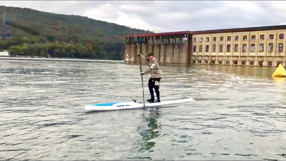 Michael Dunlap participating in the Chattajack paddle race on a stand-up paddle board