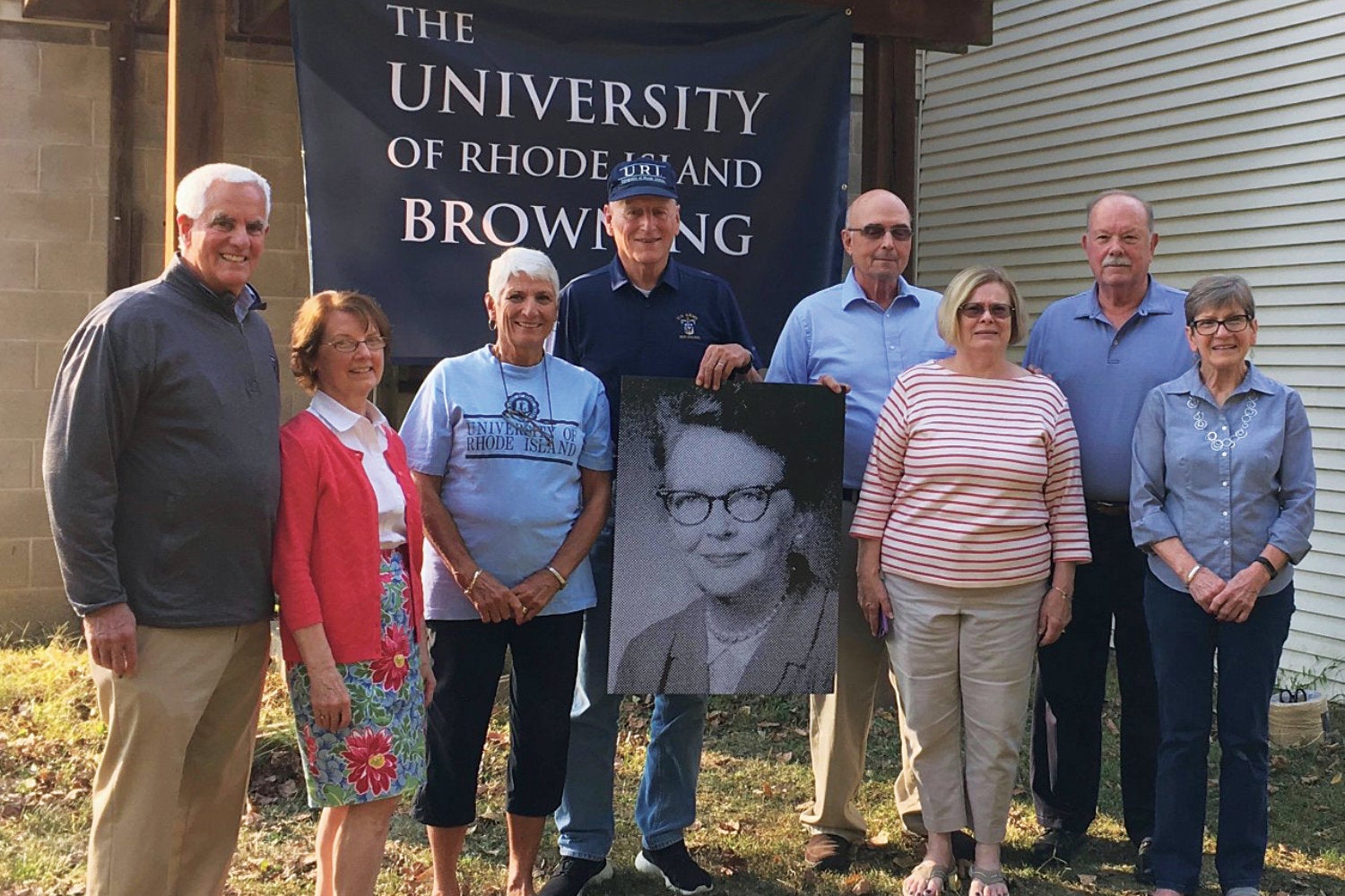 Former Browning Hall RS's hold a picture of their former house mother Deborah Whipple Lambrecht at a recent gathering
