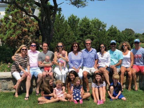 Tom and Cathy Ryan (center) with their children and grandchildren at a recent family gathering