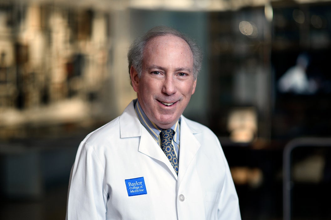 Jeffrey Ross dressed in a lab coat