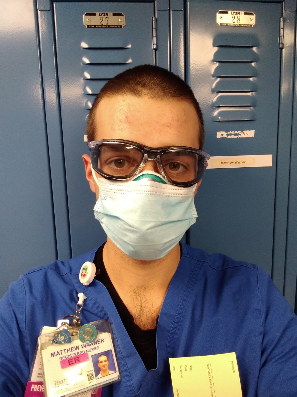 Matt Warner wearing a mask and scrubs