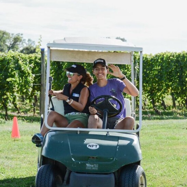 Susan Rancourt and her son at the Wine Run at Newport Vineyards