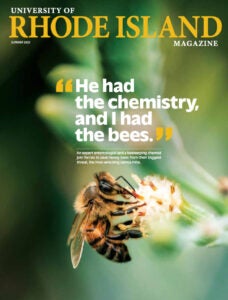 University of Rhode Island Magazine Cover featuring a honey bee gathering nectar and the following quote: "He had the chemistry and I had the bees."