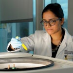 Associate Professor Jyothi Menon performing research on nanoparticles