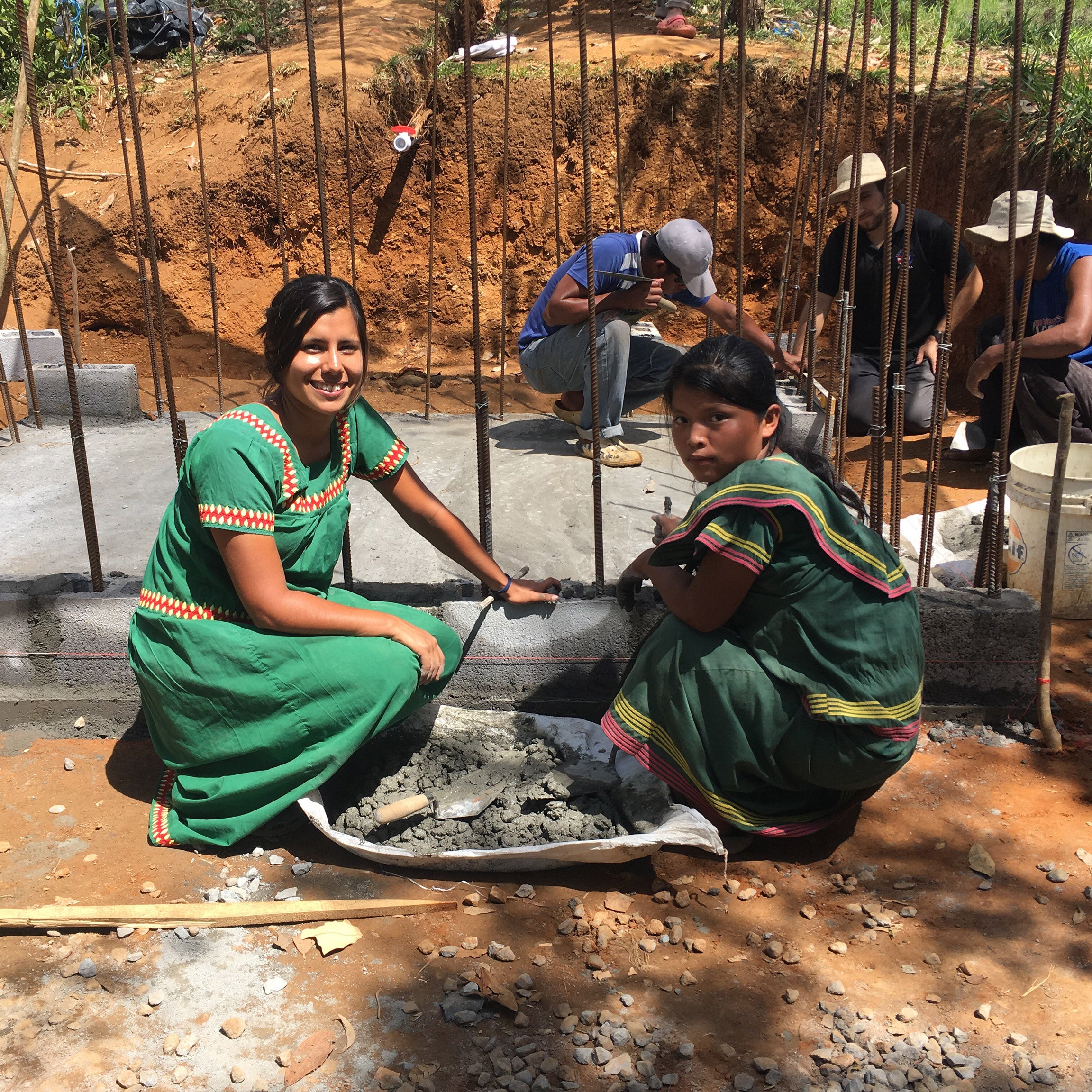 Maria Briones helping villagers
