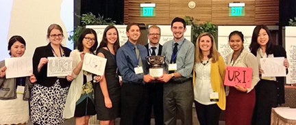 University of Rhode Island College of Pharmacy students Matthew Lippertshauser and Ethan Melillo, who won the 2016 Student and Pharmacist Self-Care Championship at the 12th Annual New England Pharmacists Convention September 23 at Foxwoods Resort Casino in Mashantucket, Conn, are joined by classmates and faculty after the win. From left, Helen Kim, Brittany Durgin, Ting-Chia Liu, Emily Kaminski, Lippertshauser, Clinical Professor Jeffrey Bratberg, Melillo, Clinical Professor Kelly Orr, Darlene Tat and Kyunghye Lee. (photo courtesy of Nicole Asai)