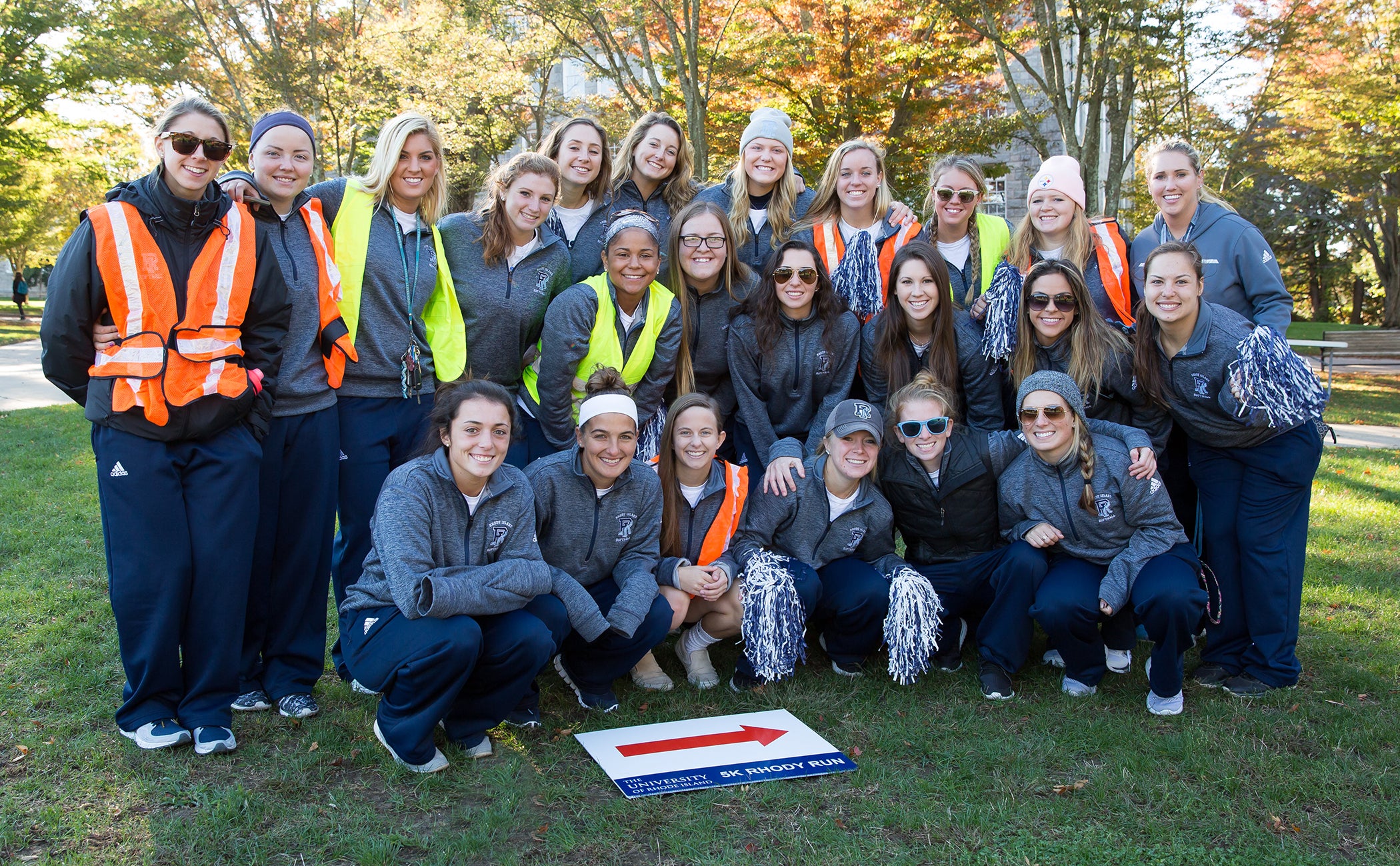 ALL IN FOR MENTAL HEALTH AWARENESS: Members of the URI softball team are all les as they volunteer at URI's Be 5K for Mental Health Awareness and Suicide Prevention Sunday, Oct. 23 on the Kingston Campus. URI photo by Jessica Vescera.