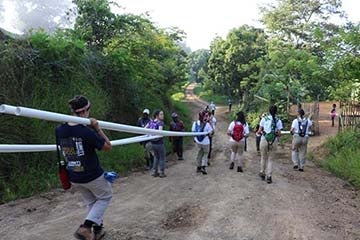 Malloy (front left) and the rest of the team heading for the water source for the village of Valle Nuevo. Photo courtesy of Elizabeth Malloy