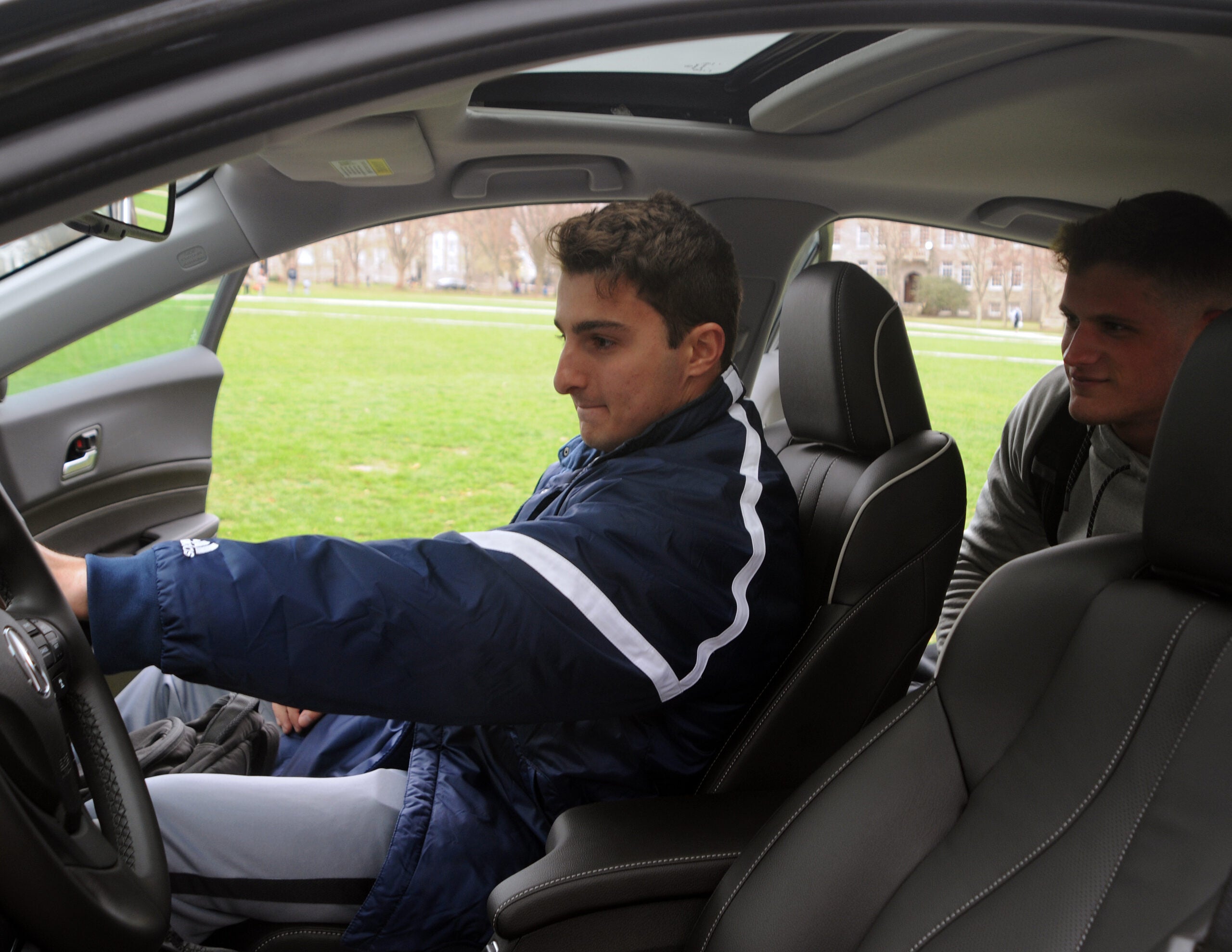 Jake Gulemi, left, and Jeffrey Urvater check out the Acura ILX