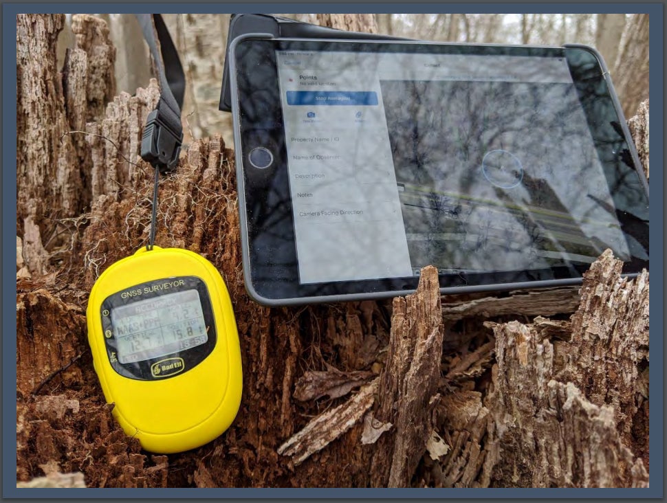 gnss surveyor being used for field research
