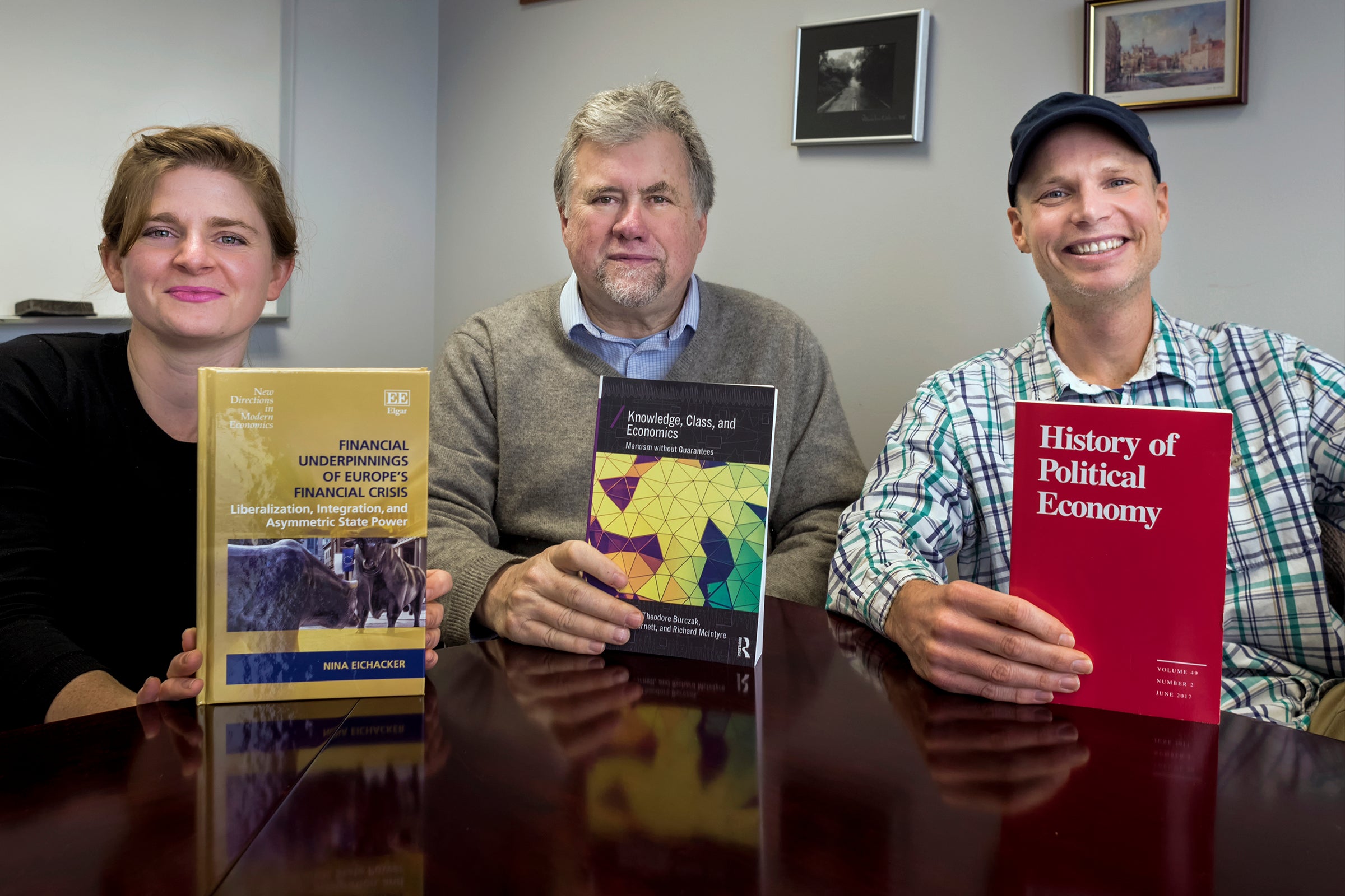Three Economists
