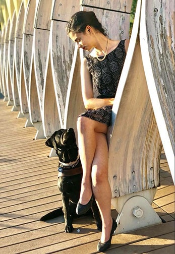 Aria Mia Loberti with her guide dog Ingrid