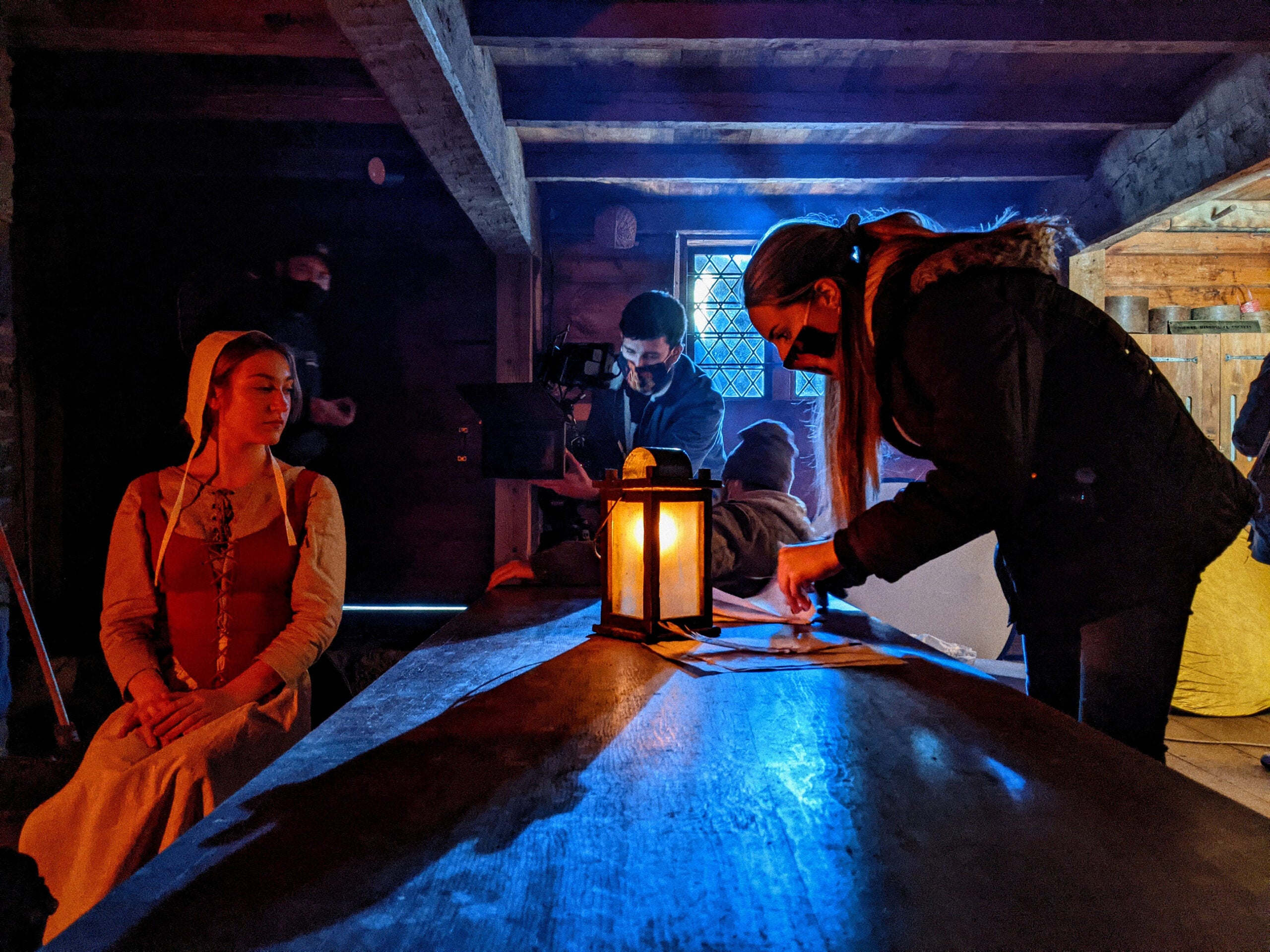 Director Alyssa Botelho ’21 talks with actress Paulina Knaak as cinematographer Sean Campbell prepares to film a scene from “To Dust All Return.” (Photo by Nick Doyle)