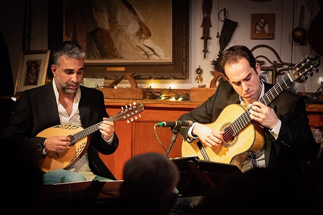 Mandolinist Jacob Reuven, left, and festival director Adam Levin perform at the 2018 URI Guitar Festival. Photo by Bogdan Urma.