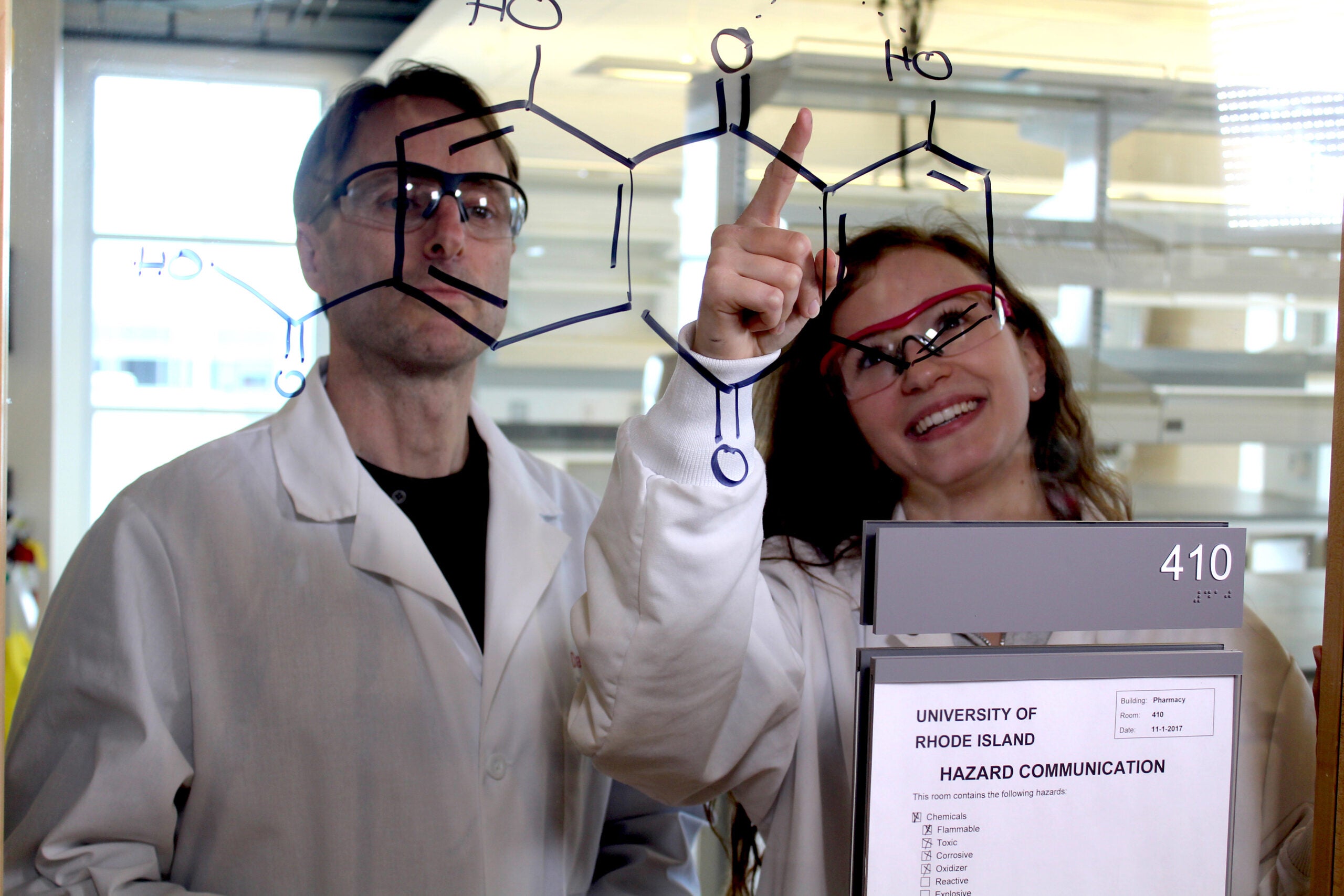Professor David Rowley works with student Zoe Perkins