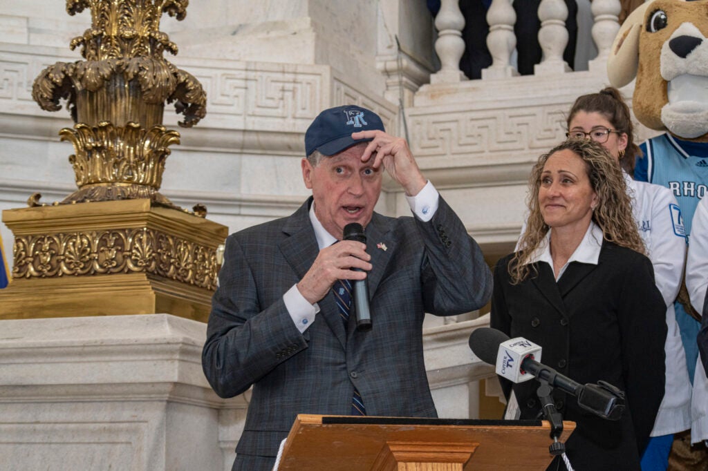 RI Governor Daniel McKee speaks behind a podium