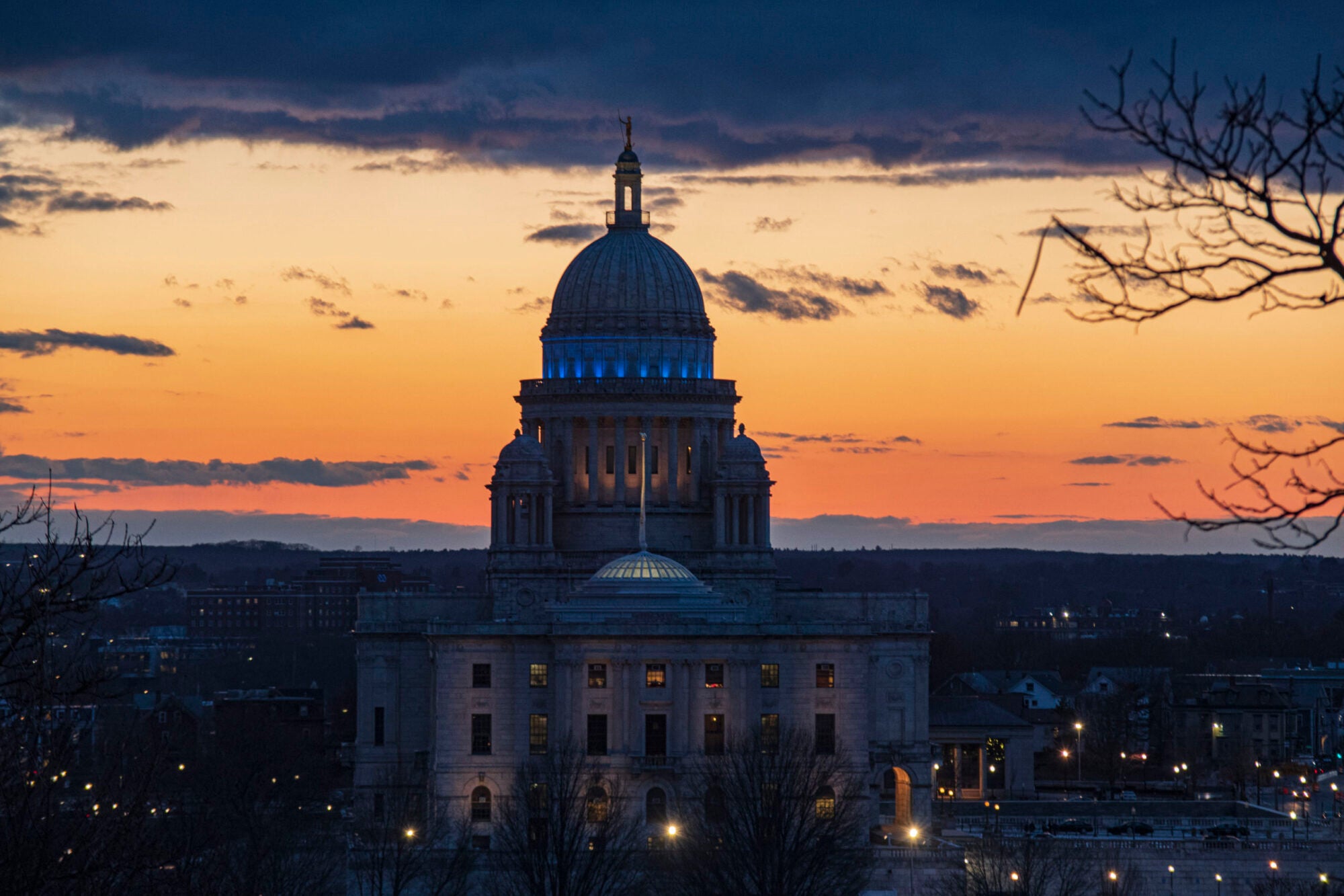 The RI state capital silhouetted against the sunset