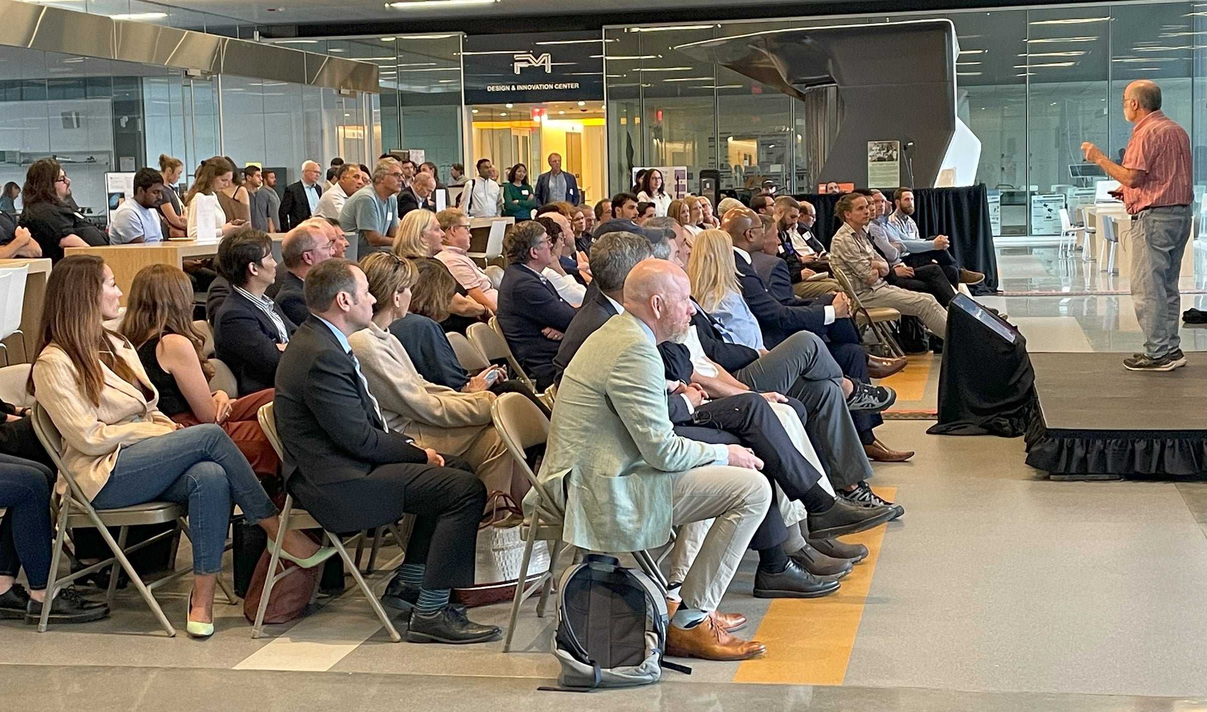 Presenter speaks to audience at the URI Tech Showcase