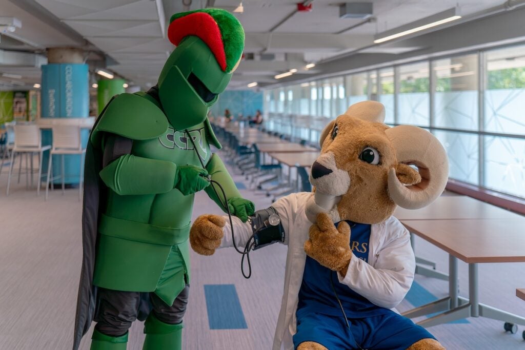 CCRI’s Knight mascot takes URI’s Rhody Ram’s blood pressure