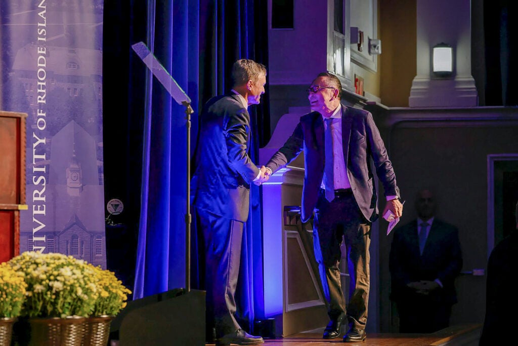 President Marc Parlange greets Gerald Chan