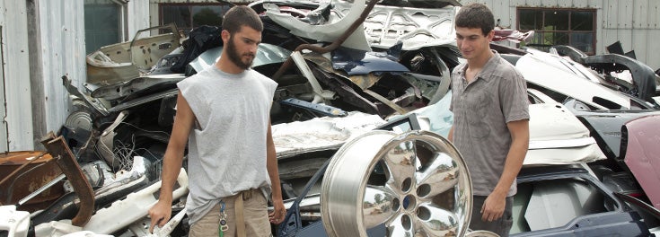 Don't just study business. Start one. Two URI students at their recycling business
