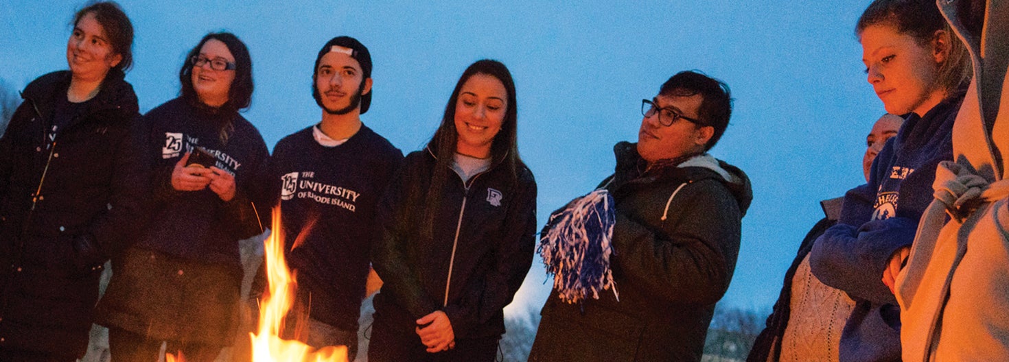 Students gathering around fire pits on the Quad