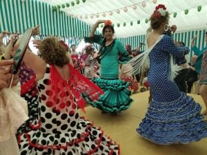Women dancing in Seville, Spain