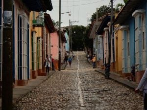 street with multi-colored houses in Trinidad, Cuba