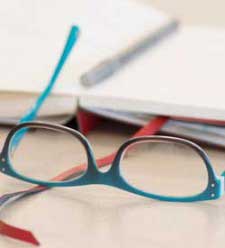 eyeglasses and notebook
