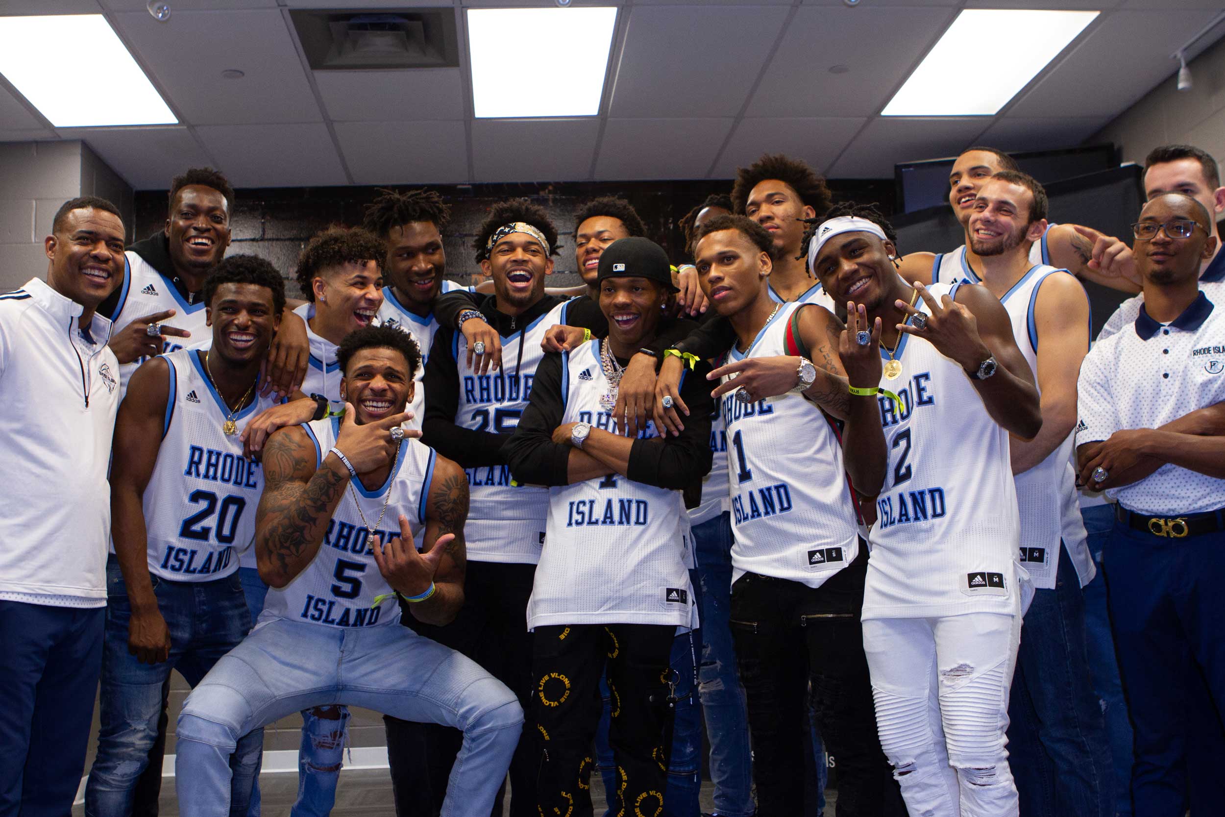 URI men's basketball team and Coach Thompson with Lil Baby