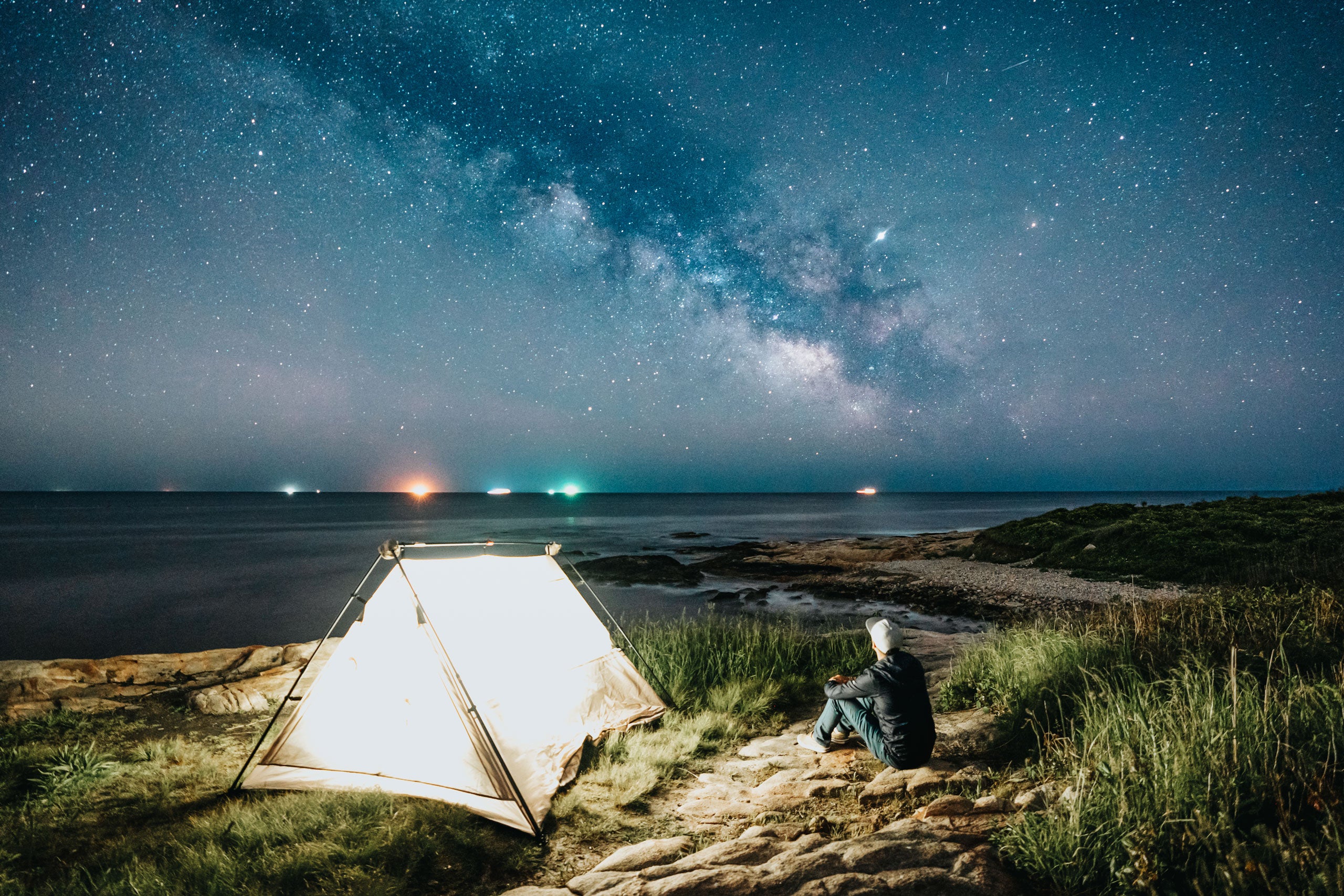 Corey Favino looking at the night sky over Narragansett