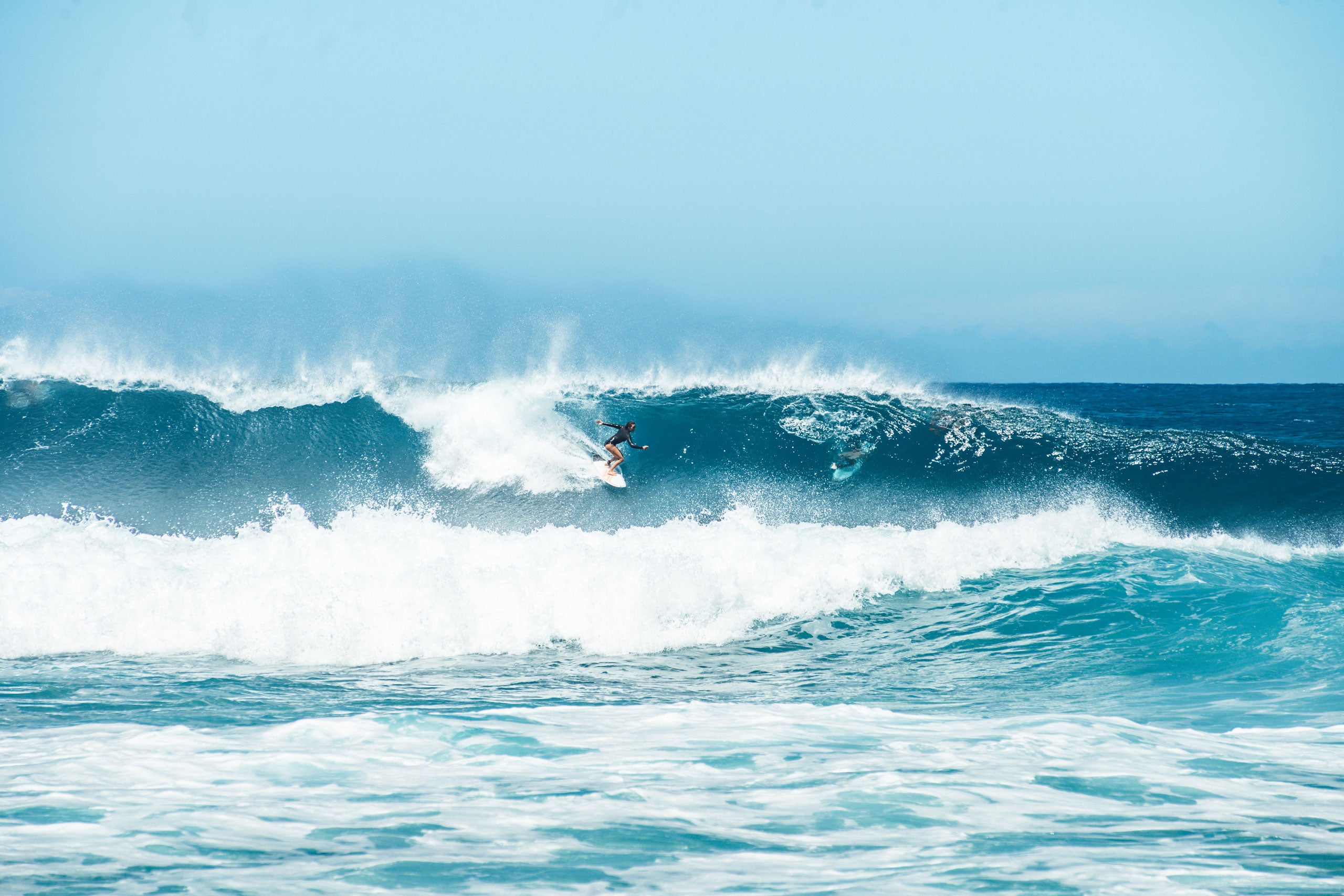 Surfer riding the waves, Oahu, Hawaii