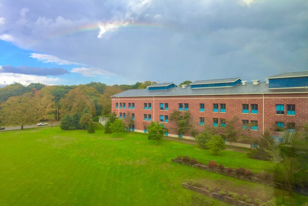 a rainbow over the Pharmacy quad