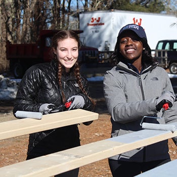 Alternative Spring Break students working on a Habitat for Humanity building project