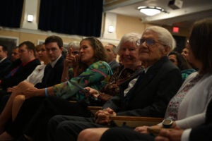 Mary Parlange sits in the crowd at President Parlange's inauguration