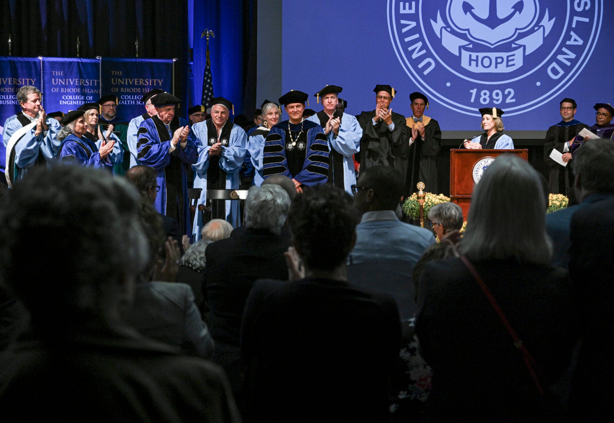 President Parlange on stage at his inauguration, surrounded by university leadership
