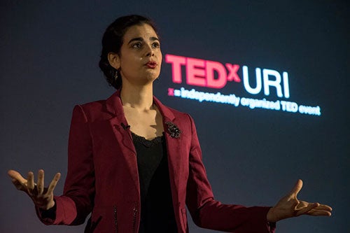 Aria Mia Liberti speaking at TEDxURI in 2018