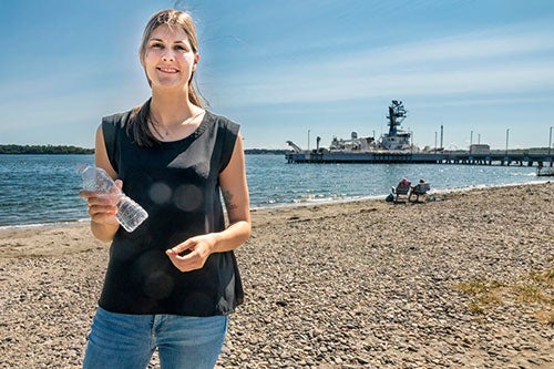 Researcher Victoria Fulfer conducting microplastics study on Narragansett Bay