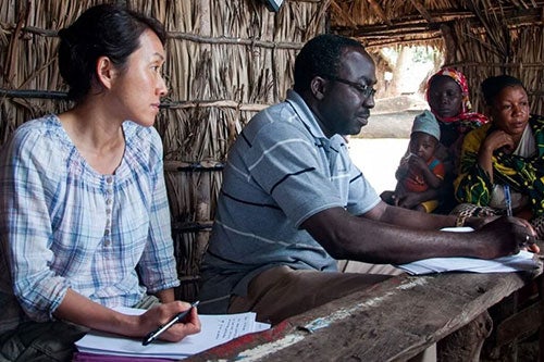URI professor Emi Uchida interviews members of a coastal community in Tanzania